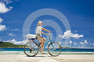 Woman ride along The Beach