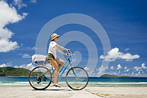 Woman ride along The Beach