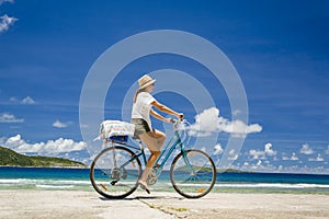 Woman ride along The Beach