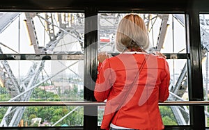 A woman rides on a ferris wheel in Vienna, Austria.