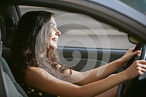 Woman rides nice car