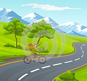 Woman riding bicycle on asphalt road near green trees, hills at snowy mountains background