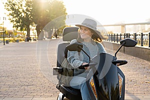 Woman riding an electric scooter