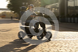 Woman riding an electric scooter