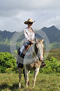 Woman riding a horse