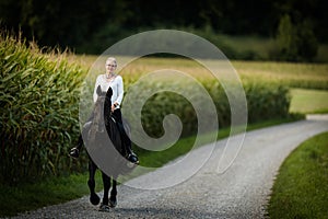 Woman riding a horse. Equestrian sport