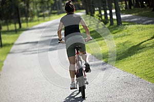 Woman riding mountain bike