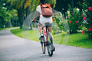 Woman riding mountain bike