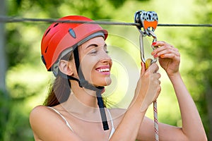 Woman riding on a zip line