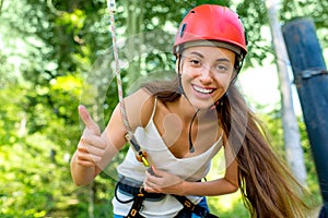 Woman riding on a zip line