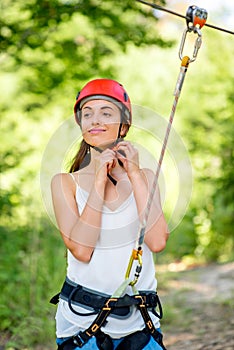 Woman riding on a zip line