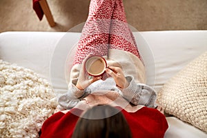 woman rinking coffee at home on christmas