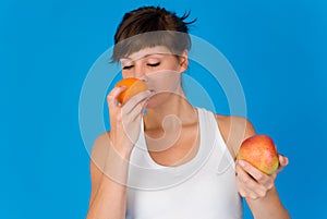 Woman with ripe fruit