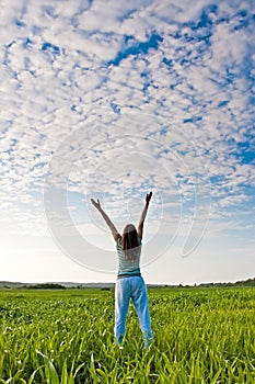 Woman rising up hands