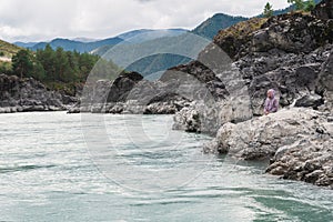 Woman at the river Katun