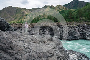 Woman at the river Katun