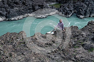 Woman at the river Katun