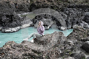 Woman at the river Katun