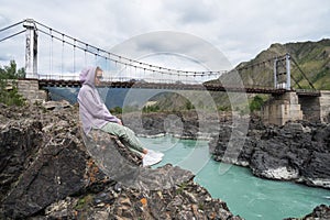 Woman at the river Katun
