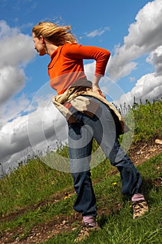 Woman, road and clouds. Sibir.