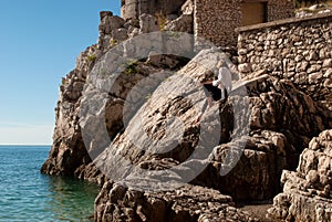 The woman on the rocks of Brsec, eastern Istria