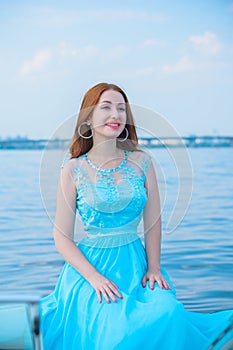 Woman in romantic blue dress, trends concept