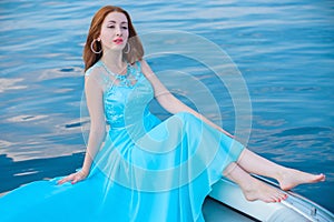 Woman in romantic blue dress, trends concept
