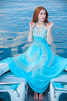 Woman in romantic blue dress, trends concept