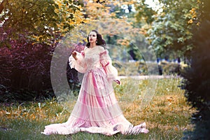 Woman in romantic pink dress