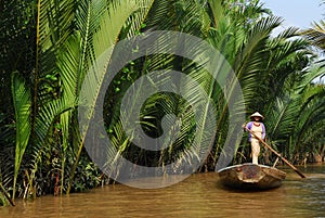 Woman rowing a gondola