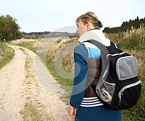 Woman with rucksack walking