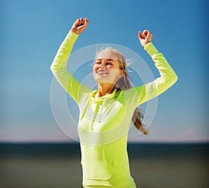 Woman runner celebrating victory