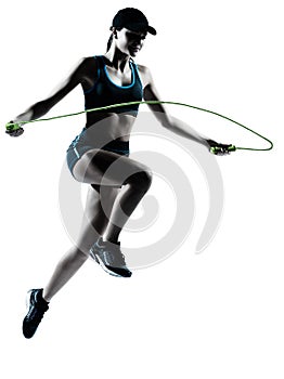 Woman runner jogger jumping rope