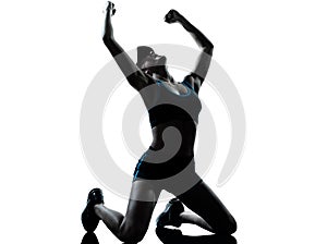 Woman runner jogger kneeling winner victory photo