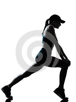 Woman runner jogger stretching warm up silhouette