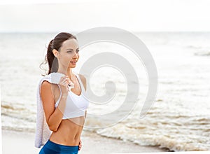 Woman runner running on the beach