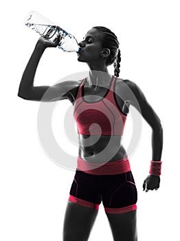 Woman runner running jogger drinking silhouette