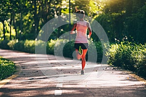 Woman runner running on morning
