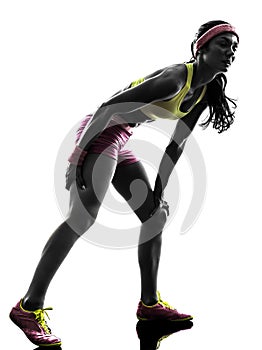 Woman runner running pain muscle cramp silhouette photo