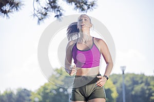 Woman runner running in park