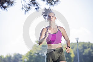 Woman runner running in park