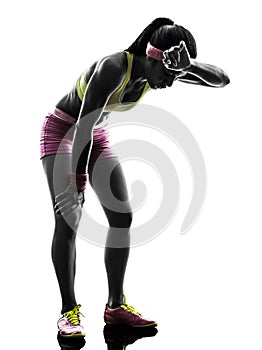 Woman runner running tired breathless silhouette