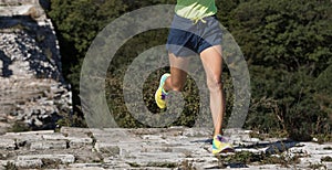 woman runner running on the top of great wall