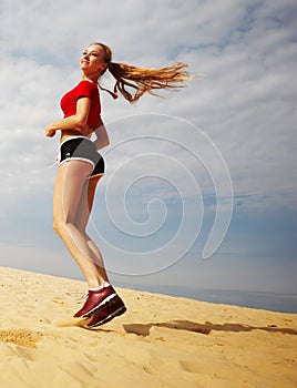 Woman running on beach