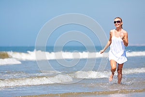 Woman running on the beach