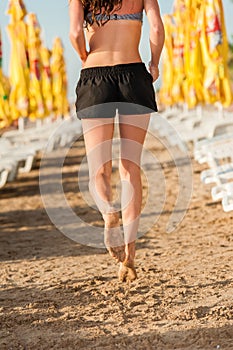 Woman running on beach