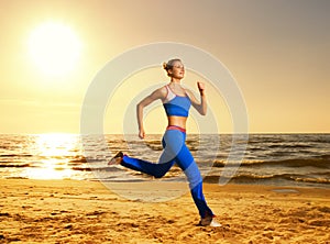 Woman running on a beach