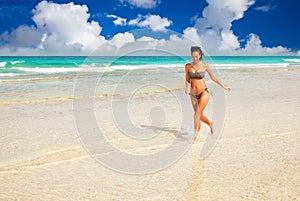 Woman running on the beach