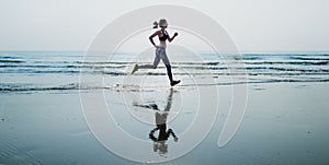 Woman Running Beach Morning Exercise Concept