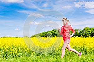 Woman running for better fitness in spring